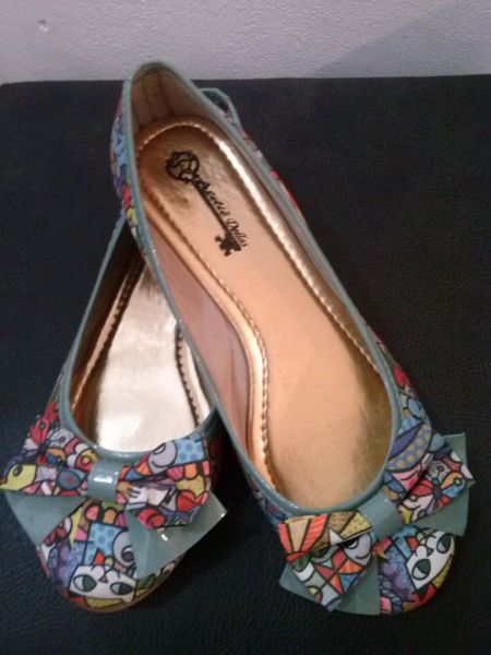 Laço Romero Britto
